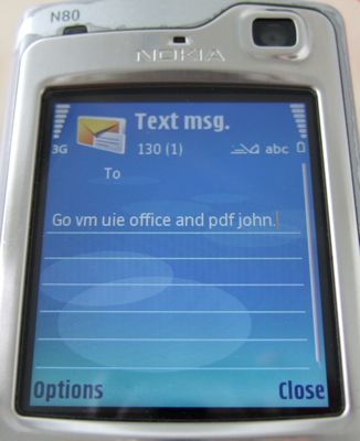Text message showing "Go vm uie office and pdf john"